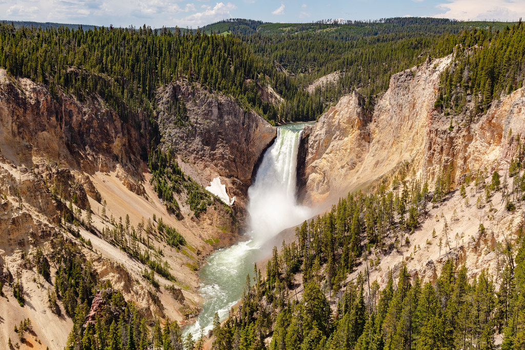 The Lower Falls of the Yellowstone River -- one of the most iconic Yellowstone waterfalls. It's located along the Yellowstone Upper Loop Road.