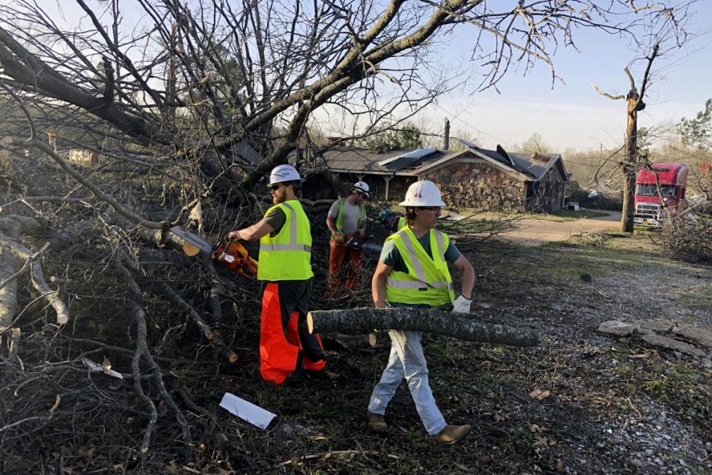 Workers Remove Debris In Wynne, AR