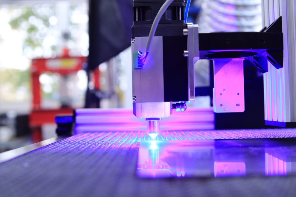 Closeup of 3D printer with laser
