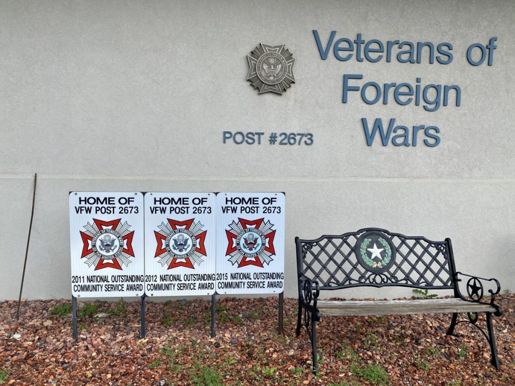 Bench and placards outside Cody VFW Post 2373