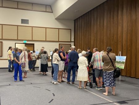 Attendees viewing renderings at Cody Wyoming Temple Open House